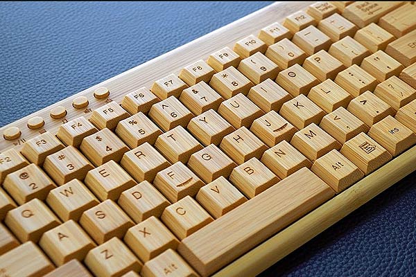 Bamboo Keyboard close up on blue table