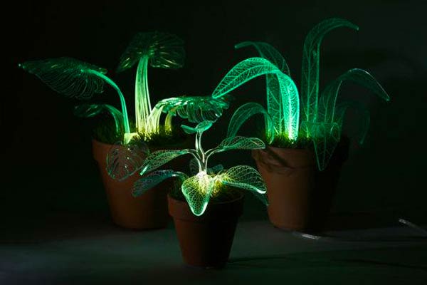 three green acrylic plant lamps